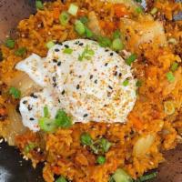 Kimchi Chorizo Fried Rice · Kimchi, pork chorizo, onions, sunny side up egg, toasted sesame, scallions