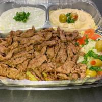 Beef Plate With Pita Bread صـحن بيـف  · Beef, rice, pita, onion, tomato, tzatziki, lettuce, and choice of sauce. Hot sauce, garlic s...