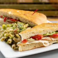 Torino · Smoked turkey breast, focaccia bread, provolone cheese, romaine, roasted red peppers, roma t...