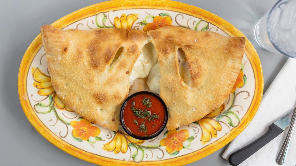 Sweet & Spicy Calzone · Chicken, red onions, mozzarella, ricotta, sweet and spicy sauce. Ranch.