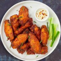 Classic Wings · Fresh chicken wings breaded and fried until golden brown. Served with a side of ranch or ble...