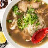 Beef Pho Spicy Soup · Eye round, brisket, tendon, tripe, beef meatball with Pho noodle.