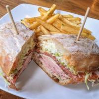 Grinder · Copa, calabrese, black forest ham, aged provolone, pepper relish, red onion, shredded iceber...