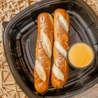 Soft Bavarian Pretzels · Bavarian Style Pretzel Stick is soft & sweet.  Served with our
house beer cheese.