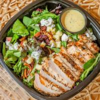 Apple Havest Grilled Chicken Salad · Tossed mixed greens, covered with candied pecans, dried cranberries, sliced apples, blue che...