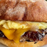 Breakfast Sandwich · House made sausage patty, cheddar, scrambled egg, caramelized onion jam and roasted red pepp...