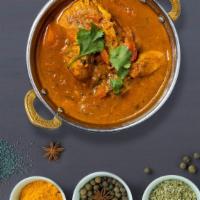 Free-Love Chicken Curry · Free range chicken breast in a tomato based onion gravy with freshly ground spices.