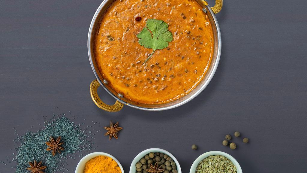 Do Me Dal Makhani · Creamy lentils cooked with tomatoes, onions. Infused with freshly ground spices.