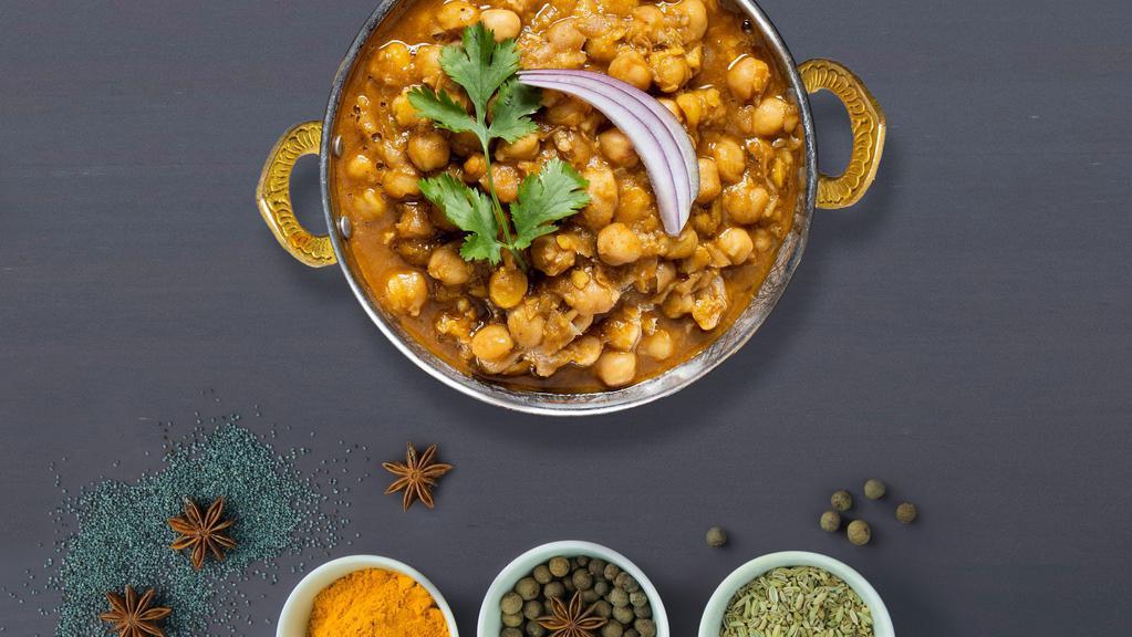 Chosen Chana Masala · Chickpeas cooked in a tomato and onion gravy with Indian spices.
