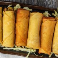 Spring Roll (4Pcs) · mixture of vegetables rolled up in a thin pancake and deep-fried.