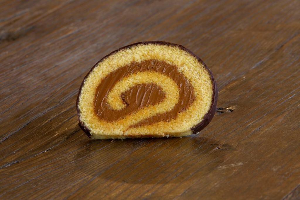 Choco Roll · Artisan sponge cake, dulce de leche, chocolate.