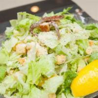 Caesar Salad · Fresh romaine lettuce prepared with a classic caesar dressing and croutons.