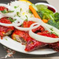 Tandoori Chicken · Gluten-free. Juicy spring bone-in chicken marinated with yogurt with flavorful and fresh gro...