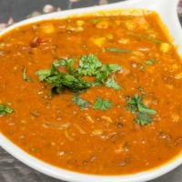 Dal Maharani (Dark Lentils) · Gluten-free, vegetarian. Creamed lentils cooked with select herbs and spices. Served with ba...