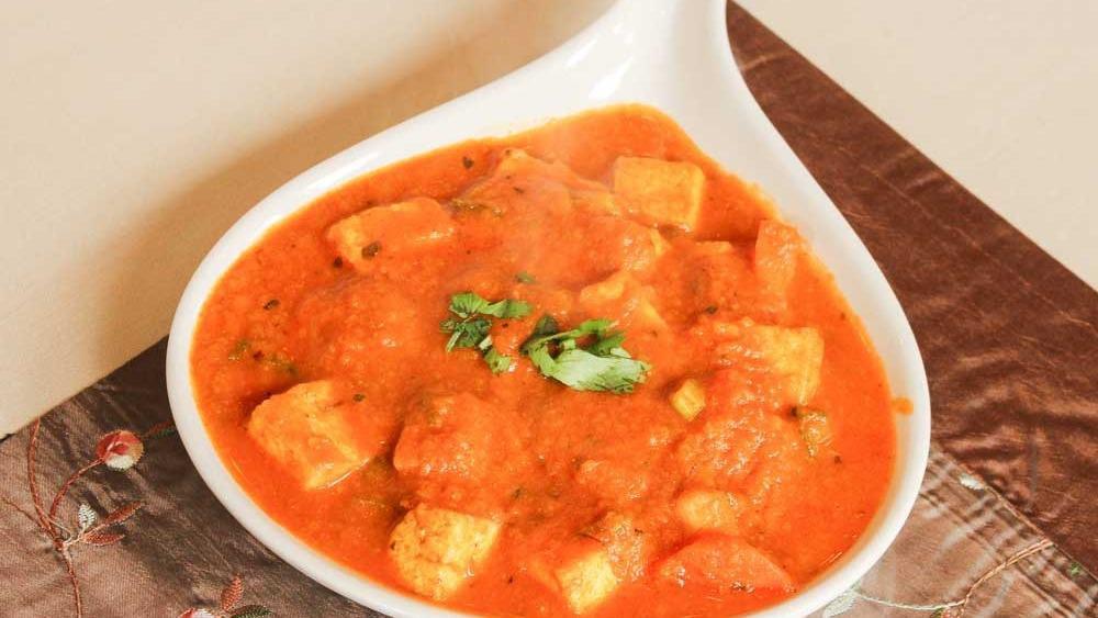 Curry Specialties Lunch · Gluten-free, vegan. A traditional brown curry prepared with tomatoes, onions and fresh herbs. All spices are American standard. Served with basmati rice.