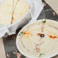 Hummus · Gluten-free, vegan. The original middle Eastern dip of garbanzo beans, tahini sauce and a sp...