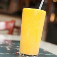 Mango Lassi · Traditional Indian drink made with mango, homemade yogurt, milk and rosewater.