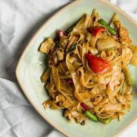 Drunken Noodle  · Vegetarian. Jumbo rice noodles with choice of meat/veggie, eggs, basil leaves, onion, bell p...