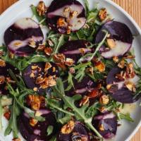 Beet Salad · roasted Blue Truck beets, pears, arugula, pistachio vinaigrette, pickled red onion