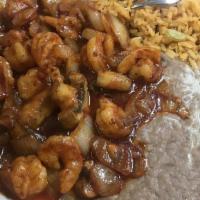 Camarones A La Diabla · Spicy. Double spicy shrimp sautéed in a Mexican red sauce. Served with rice, beans, your cho...