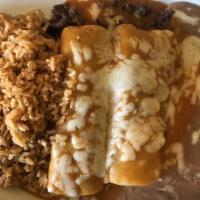 2 Enchiladas · Two corn tortillas filled with your choice of meat