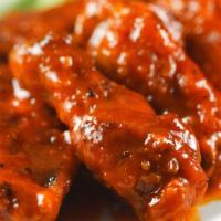 Chicken Wing Feast · 24 Chicken wings, tossed with your choice of hot sauce, BBQ or lemon pepper oven roasted alo...