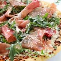 Prosciutto & Arugula Gourmet Pizza · Our original Pizza sauce , Oregano, garlic, Italian Prosciutto  topped with Arugula infused ...