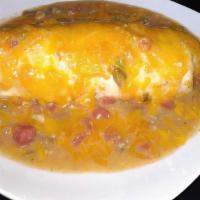 Sausage Burrito Smothered · Egg, Potato, Cheese, Smothered with Pork, Green Chili.