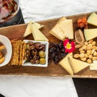 Cheese Board · 5 artisanal cheeses from around the world, one sheep and one goat – Wrångebäck, black truffl...