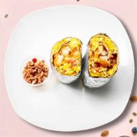 Bae-Con Breakfast Burrito · Bacon, eggs, chunky potatoes, american cheese, tomatoes and caramelized onions wrapped in a ...