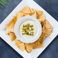 Chips & Queso · Plain chips with queso dip on the side.