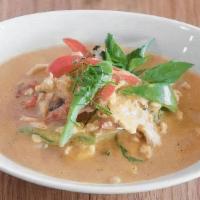 Paneng Neua · Spicy beef curry with coconut milk , sweet basil and bell peppers