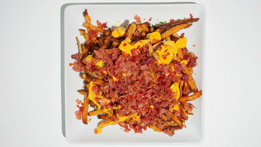 Bacon & Cheese Fries · Homemade fries with s&l seasoning or regular fries topped with melted cheese and bacon.