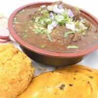 Birria En Caldo · Broth and meat, served in a bowl, side of rice, six tortillas, onions and cilantro.