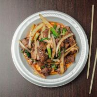 Mongolian Chicken And Beef · With brown sauce and vegetables.