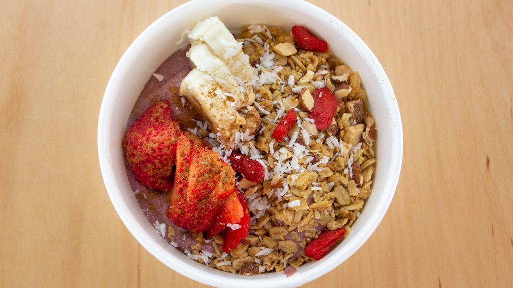 Small Bowl Of The Gods · Peanut butter, acai, banana, strawberries, vanilla lucuma protein, hemp milk, crushed almonds, goji berries, coconut flakes, Grizzlie's granola, cinnamon and maple syrup drizzle. No Substitutions.