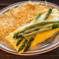 Ham & Asparagus Omelette · Diced ham, mushrooms, onions and cheddar cheese topped with grilled asparagus and hollandaise.