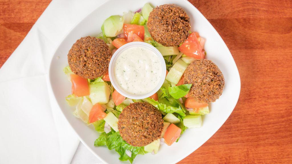 Falafel Appetizer  · Four pieces of Falafels on freshly made salad. With side of Tahini.