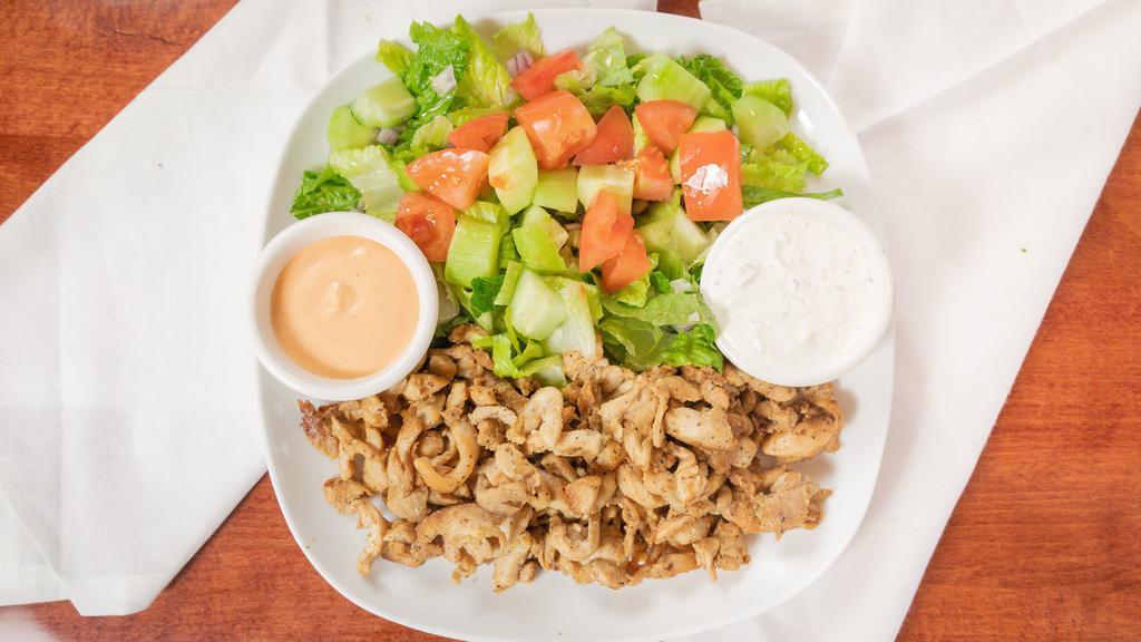 Chicken Shawarma Plate  · Chicken Shawarma on rice or salad, side salad and Tzatziki.
