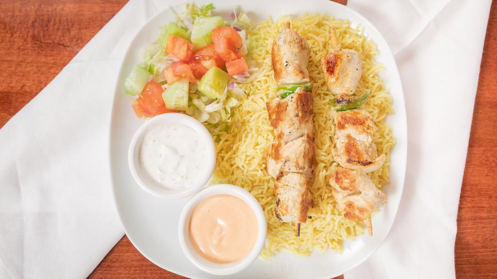 Chicken Shish Kabab Plate  · Chicken Shish Kabab on rice or salad, side salad and tzatziki.