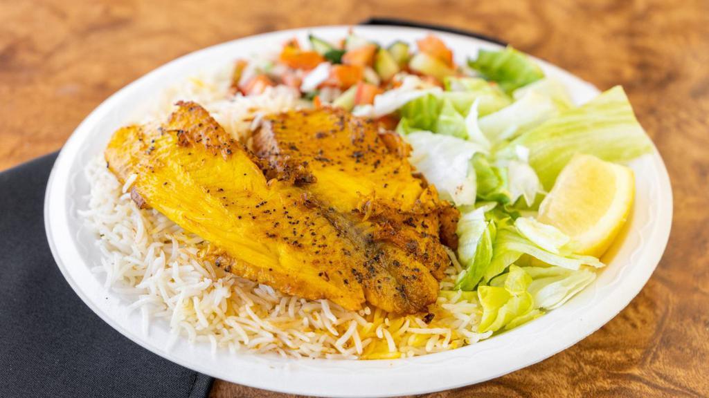 Fish Kabob · Tilapia marinated in fresh grated spices. Served with rice, salad and fresh bread.