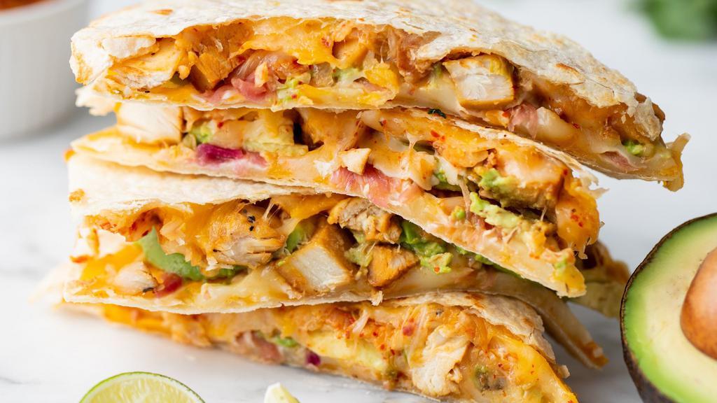 Crispy Quesadilla · Your choice of protein, cheddar jack cheese, kimchi, pickled onion, scallion, cilantro, and your choice of dipping sauce.