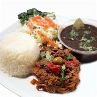 Ropa Vieja Plate · Shredded beef. Served with rice, black beans, salad, onion, cilantro, olives and bell pepper.