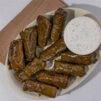 Grape Leaves · Stuffed with rice, onions spices and served with Taziki sauce.