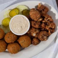 5 Pieces Falafel · Ground fava and garbanzo beans with secret spices hand formed and deep-fried. Served with ta...