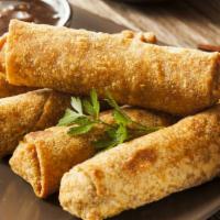 Chicken Egg Roll (1 Pc) · Crispy wonton skin stuffed and rolled with ground chicken, garlic, ginger, cabbage and carro...