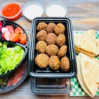 Two Dozen · Two dozen (24) Falafel balls. Comes with pita bread, veggies, hot sauce, and Tarator sauce o...