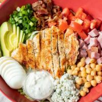 Sam'S Cobb · Crisp Romaine lettuce topped with a hard-boiled egg, chopped green onion, chickpeas, bacon, ...
