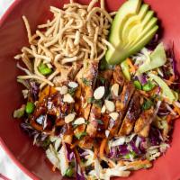 Chinese Chicken Salad · Our teriyaki marinated chicken bread on top of a healthy mix of cabbage, carrots, green onio...
