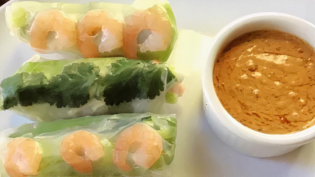 Fresh Wrapped. (2 Pc) · Salad Rolls - Rice paper wrapped with vegetables. Sweet basil, mint and tofu, served with peanut sauce.